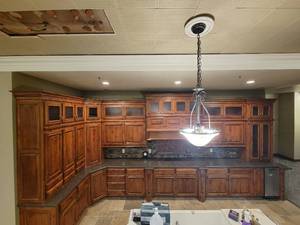 lot 24652 image: L Shape Wood Spices Knotty Alder Kitchen Display Unit - Contents in and on are NOT INCLUDED - BID FOR CABINETS and COUNTER ONLY&nbsp