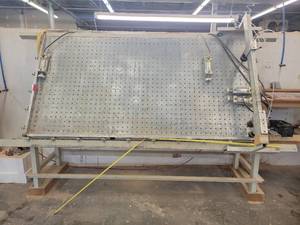 lot 24658 image: Nomadic Clamp Rack Unique Machine and Tool Model 85
