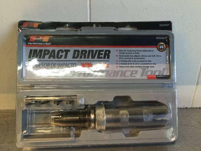 lot 2051 image: PERFORMANCE TOOL IMPACT DRIVER