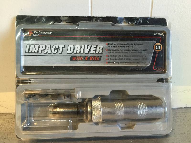 lot 2052 image: PERFORMANCE TOOL IMPACT DRIVER