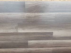lot 1 image: 8mm GREIGO OAK Laminate Flooring (Approx. 420SF)