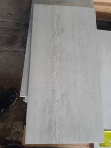 lot 83 image: 12 X 24 STONEHOLLOW WHITE Porcelain Tile (Approx. 109SF)