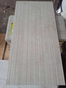 lot 90 image: 18 X 36 MELTED ICE RIGATO  Porcelain Tile (Approx. 66SF)