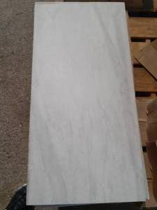 lot 91 image: 12 X 24  WHITE Porcelain Tile (Approx. 62SF)