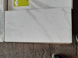 lot 79 image: 12 X 24 WHITE MATTE Porcelain Tile (Approx. 93SF)