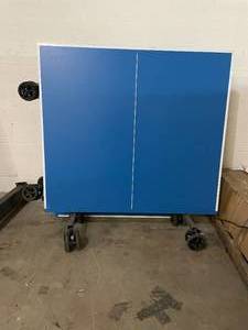 lot 34 image: Expensive Outdoor Table TennisPing Pong Table-  Needs 1 Wheel or Remove The Other 3