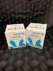 lot 52784 image: Luxrite LED - Dusk to Dawn Sensor - Soft White Outdoor Bulb - 1250 Lumens - Set of 2