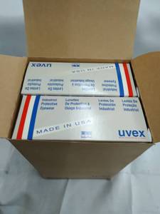 lot 1287 image: Uvex Astrospec 3000 Lot of 10 Blue Frame Clear Lens Ultrudora Hardcoat