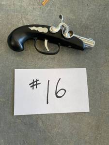 lot 16 image: Pistol Lighter