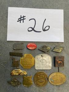 lot 26 image: Vintage tokens  tags, coca cola, tinsleys, badges.