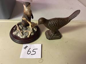 lot 65 image: Otter figurine, and cast iron bird figurine.