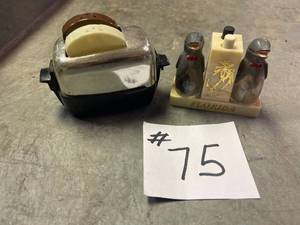 lot 75 image: toaster salt and pepper, dolphin salt and pepper shakers.