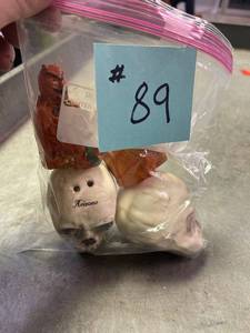 lot 89 image: Devil guy and skull head Salt and Pepper Shakers