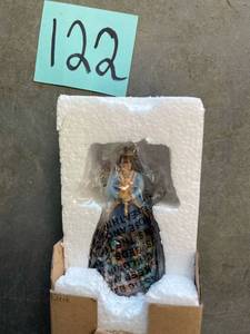 lot 122 image: Jim Shore Brand Angel with Nativity Scene Ornament