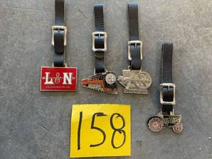 lot 158 image: Watch Fobs Key Fobs L&ampN, steam engine, tractors.