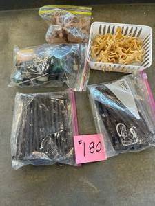 lot 180 image: Plastic cowboys and Indians figurines, with plastic brown fence, and accessories.