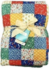lot 648 image: The Pioneer Woman Floral Patch Quilt Set, 3 Piece FullQueen Pillow Patchwork