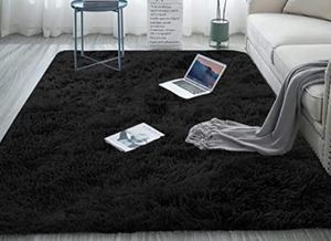 lot 4280 image: Black Area Rug