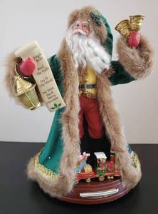 lot 4 image: We Wish You A Merry Christmas, Thomas Kinkade Season of Harmony Caroling Santa Collection