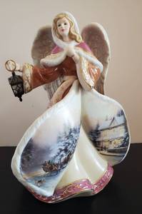lot 9 image: Angel of Love, the 8th Issue in the Thomas Kinkade Winter Angels of Light Heirloom Porcelain