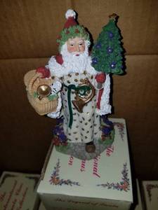 lot 33 image: Welsh Father Christmas Figurine International Santa Claus Collection 1998
