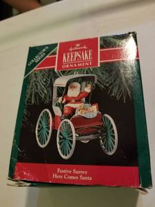 lot 156 image: Hallmark ornament here comes santa