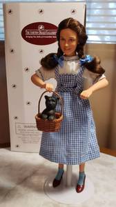 lot 119 image: Wizard of Oz Dorothy & Toto Vinyl Portrait Doll wOriginal Box  14 in. tall  Ashton-Drake Galleries