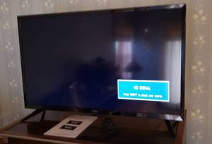 lot 143 image: Onn Digital LED TV  32 in. w Remote and Manual  Powers On