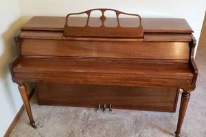 lot 336 image: Vintage P. A Stark Piano Comapany Spinet Piano - 57Wx24Dx36T - on main floor close to front door. MUST bring help to moveload