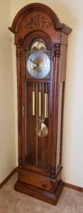 lot 341 image: Vintage Trend Grandfather Clock - Style# 882WM-243 Movement# 109 AL - From The Clock Shop, Wichita, KS in 1979.   One side glass has slight crack. 21Wx11Dx78T - Located on main floor close to front door. Must bring help to moveload.