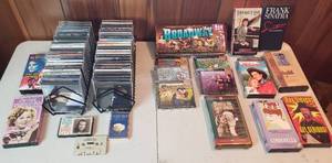 lot 518 image: CDs in Racks, VHS and Cassettes