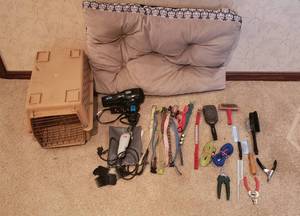 lot 525 image: Dog Grooming supplies, dog bed, collars, leashes, pet carrier