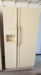 lot 800 image: Kenmore Side by Side RefrigeratorFreezer (1999)  Powers On  Thermostat issues  In Garage, Ready to Load Out  33 x 33 x 66.5 in. tall  Almond Color
