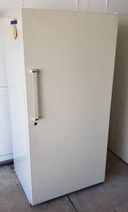 lot 801 image: Kenmore Freezer 19 Cu. Ft.  Powers On & Works  In Garage, Ready to Load Out  31 x 32 x 64 in. tall  Almond Color  Has Key