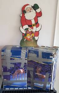 lot 820 image: Holiday Time Animated Grapevine Reindeer in Boxes (42 & 52 in. tall) and Santa on Hardboard