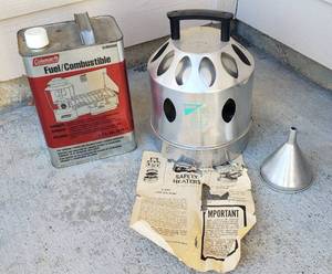 lot 822 image: Vintage Wards Riverside Safety Heater 61-8197 model and Partial can of Coleman Fuel