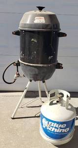 lot 834 image: Coleman Propane Smokergrill with tank - partial full. 45in tall
