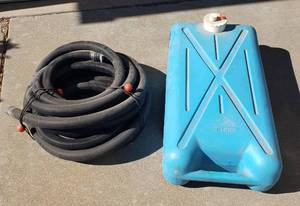 lot 835 image: 10 Gallon drain water tank with hose