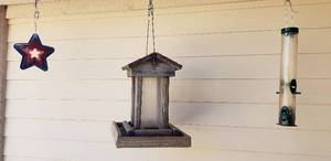 lot 842 image: Bird feeders & lasercut whirly-jig