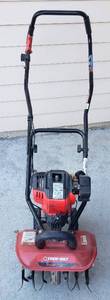 lot 859 image: Troy-Bilt Jumpstart Mini Tiller. Has compression