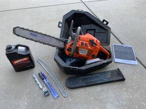 lot 894 image: Husqvarna 455 Rancher Chainsaw, Bar & Chain oil, extra blade chain, files, Craftsman carry case