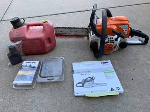 lot 895 image: Stihl MS 180C Chainsaw, gas cans, oil, 2 extra chain blades