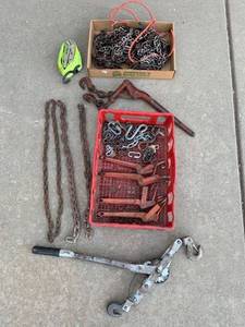 lot 898 image: Tire Chains, Ratchet strap, 5 Boomers, Cable Come-along