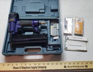 lot 914 image: Central Pneumatic Air NailerStapler in case with extra Brad nails