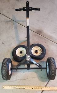 lot 956 image: Ultra Tow mover with 2 extra tires