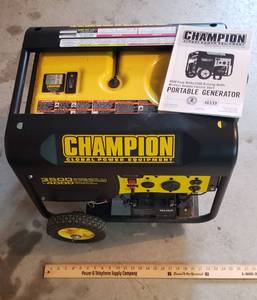 lot 957 image: Champion Portable Generator - 40003500 Watts, with Wireless Remote Electric Start - has cover