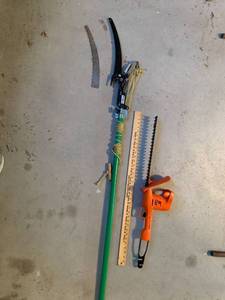 lot 988 image: Black & Decker 16in cut Trimmer, UltraPro Pole Saw & extra blade