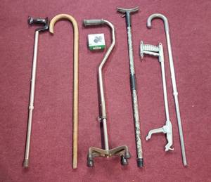 lot 605 image: Canes, Tips, Reacher
