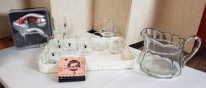 lot 625 image: Playboy Cocktail glasses, serving tray, Vintage Glass pitcher, Cocktail recipe guide, Lever Corkscrew