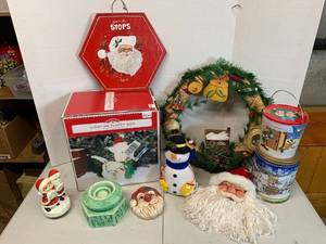 lot 651 image: Light up Dog, Christmas pillows, Santa Devor, Music Box, Wreath, Tins
